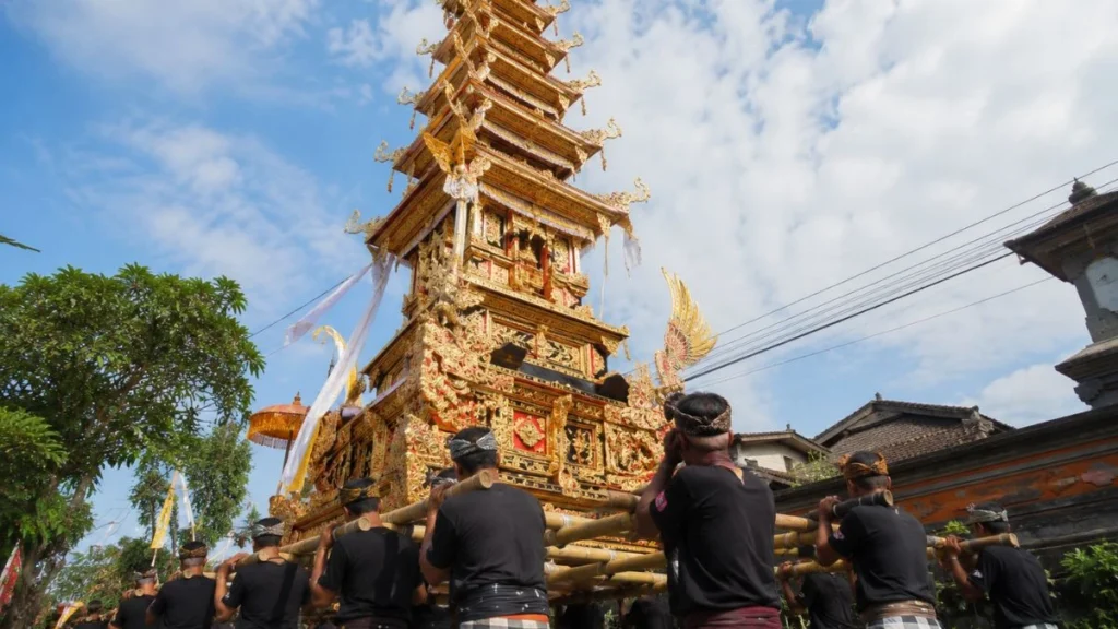 An elaborate multi-tiered cremation tower carried during a Balinese Ngaben procession